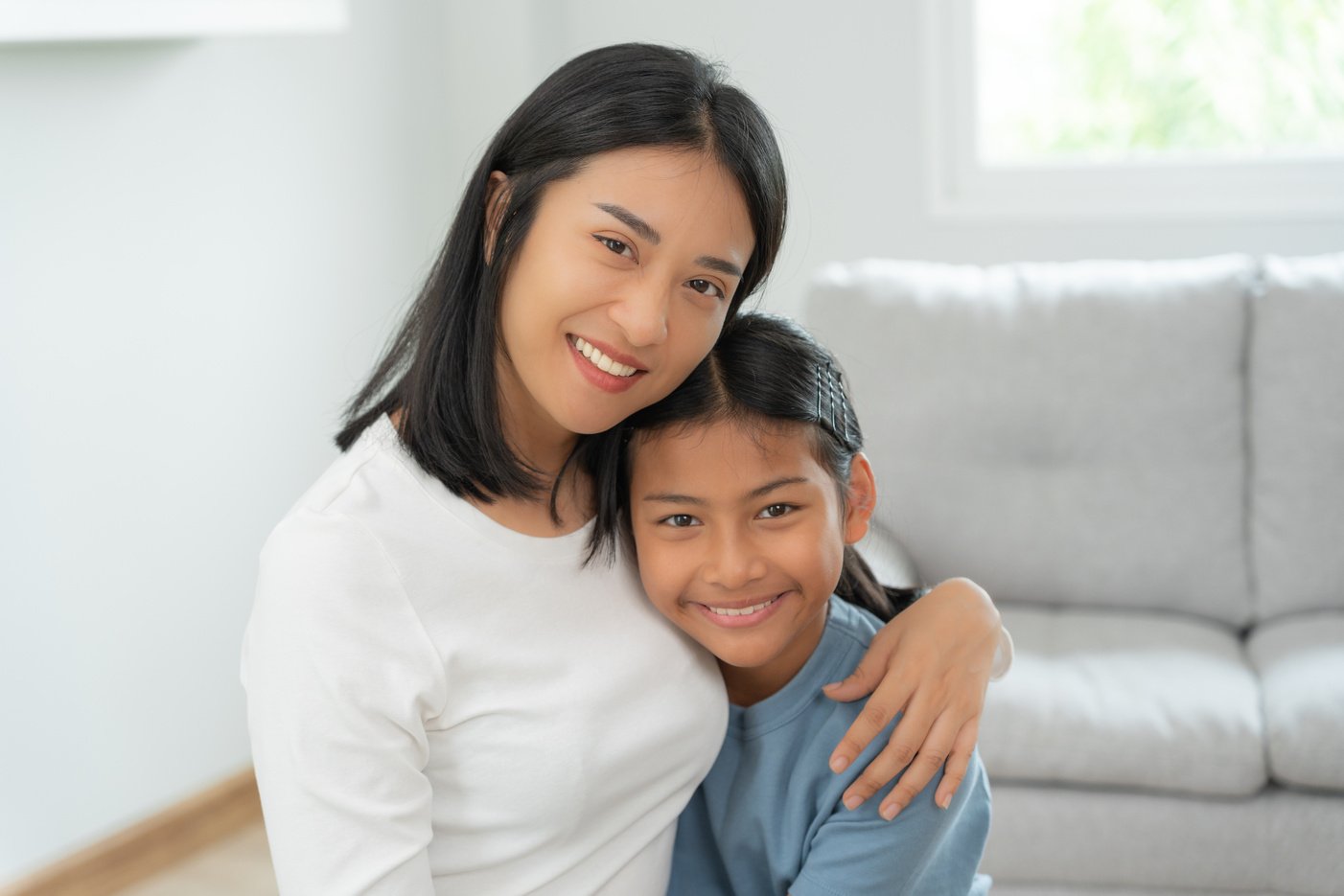 single mom happy together with daughter. Asian young mother smil